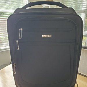 Samsonite carry on luggage. Spinner wheels, black used but an excellent shape.